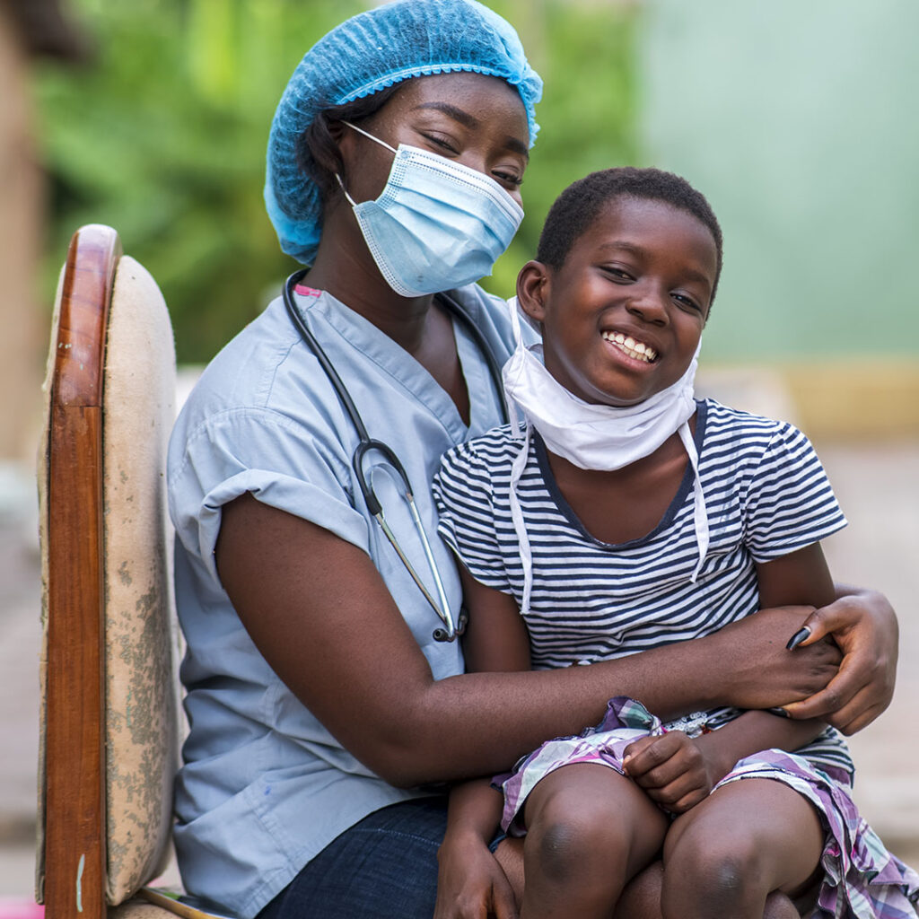 Child Siting On A Nurse